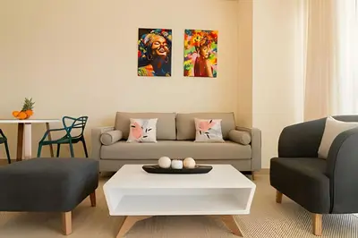 a living room with a couch and a table at Lujoso apto de 1 hab en piso 15 Edificio H2 in Cartagena de Indias