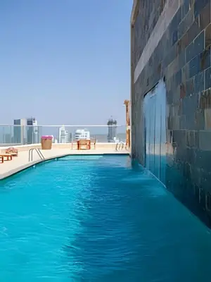 a swimming pool on the roof of a building at 1705 Palmetto Beach -17th Floor Palmetto Beach in Cartagena de Indias