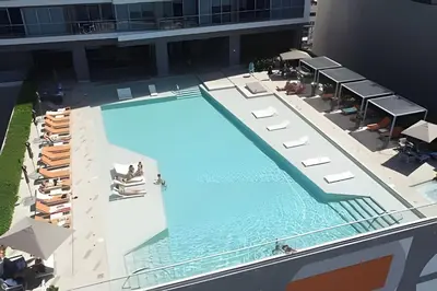 an overhead view of a swimming pool on a building at Espectacular Vista al Mar en Morros City piso 19 in Cartagena de Indias