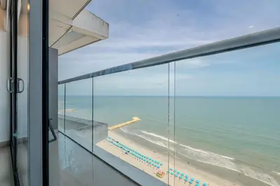 a view of the beach from the balcony of a house at 2102 Morros City - Espectacular Vista al Mar in Cartagena de Indias