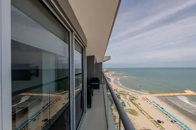 a view of the beach from the balcony of a building at 2102 Morros City - Espectacular Vista al Mar in Cartagena de Indias