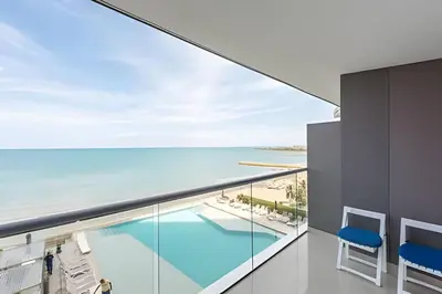 a view of the ocean from the balcony of a hotel room at Apartamento Aqua 805 - Morros City in Cartagena de Indias