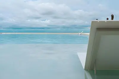a view of the ocean with people standing on the beach at Apartamento Aqua 805 - Morros City in Cartagena de Indias