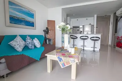 a living room with a couch and a table at Morros City-Espectacular Apto Vista al Mar Piso 8 in Cartagena de Indias