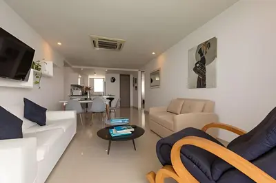 a living room with a couch and a table at 3605 Morros City - Paraiso en Cartagena in Cartagena de Indias