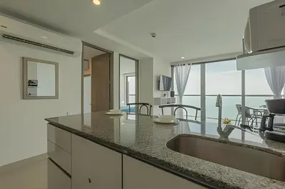 a kitchen with a sink and a counter top at Lujoso Apto de 2 Habitaciones Piso 32- Morros City in Cartagena de Indias