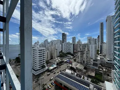 a view of a city with tall buildings at Apartamento en Bocagrande con vista lateral al mar ICDI in Cartagena de Indias