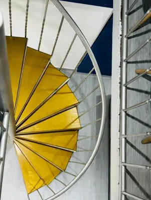 a stained glass orb hanging on a stair case at Apartaestudio Cielo Mar A 100 Mts playa - Al Frente Hotel Las Americas in Cartagena de Indias
