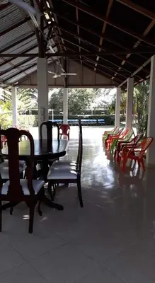 a dining room with a table and chairs at Casafinca en Arjona # 3 in Cartagena de Indias