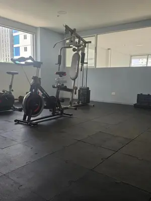 a gym with several exercise bikes in a room at Stunning Bocagrande Beach Apartment in Cartagena de Indias