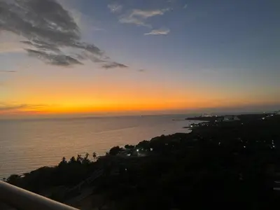 a view of the ocean at sunset at Apartamento de Lujo en Santa Marta con vista al mar -Santamarina- 1802 in Santa Marta