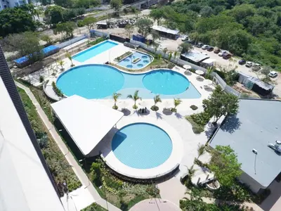an overhead view of two pools at a resort at Santa Marta apartamento frente al mar -Santamarina- 1202 in Santa Marta