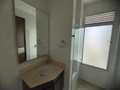 a bathroom with a sink and a mirror at Bijao 6b in Barranquilla