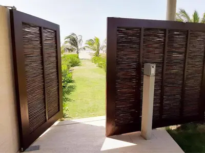 a wooden door with a view of a yard at Morros Eco in Cartagena de Indias
