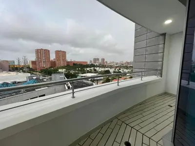 a balcony with a view of a city at Blue Gardens in Barranquilla