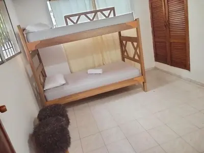 a couple of bunk beds in a room at Apartamento a 15 Min del centro in Cartagena de Indias