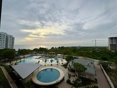 an overhead view of a pool at a resort at Apartamento cerca del mar- SantaMarina-604 in Santa Marta