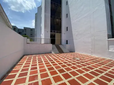 a building with a red and white tile floor at Your ideal stay in Barranquilla awaits