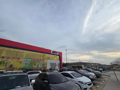 a bunch of cars parked in a parking lot at Apartment in El Cabrero in Cartagena de Indias