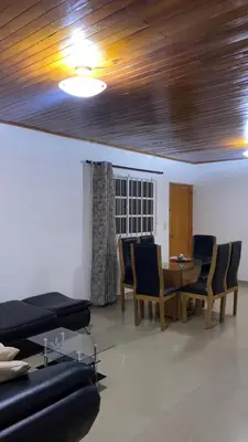 a living room with a dining room table and chairs at GUILLOTE Comfort Loft in Cartagena de Indias
