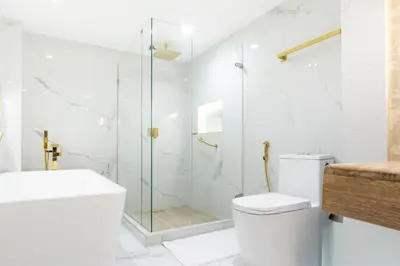 a bathroom with a shower and a toilet and a sink at Berthas collection by em hotels in Cartagena de Indias