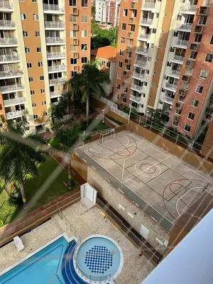an empty basketball court in a city with buildings at Apartamento 3 alcobas barrio Miramar Barranquilla in Barranquilla