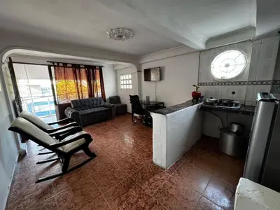 a kitchen and living room with a couch and a table at Mar azul Cartagena in Arizona