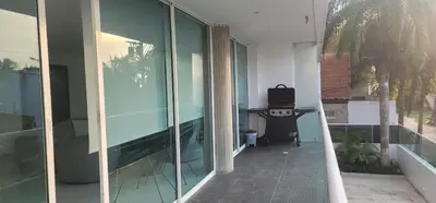 an empty hallway of a building with glass windows at Live Stay - Boquilla Le Solei in Cartagena de Indias