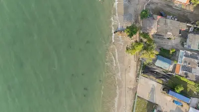 an overhead view of a beach and the ocean at Cabaña Playa Azul in Coveñas