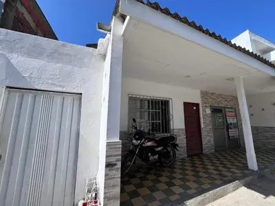 a motorcycle parked in the garage of a building at CasaMartina in Cartagena de Indias