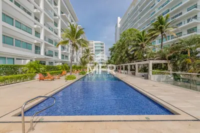 a swimming pool in the middle of a building at Morros 3, Beachfront & 2 Bedrooms in Cartagena de Indias