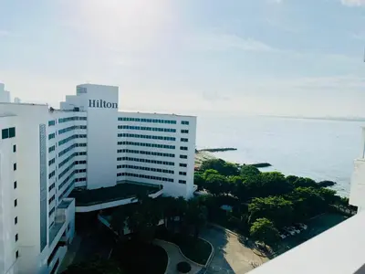 an aerial view of a building next to the ocean at Azul Caribe Home in Cartagena de Indias