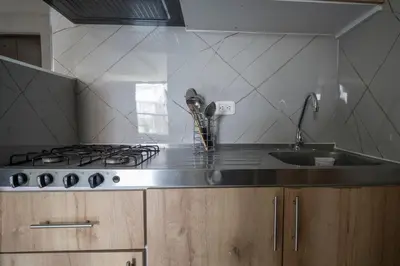 a kitchen with a stove and a sink at Aqualina 209 y 512 in Cartagena de Indias