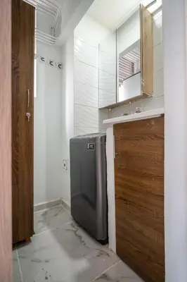 a kitchen with a sink and a refrigerator at Aqualina 209 y 512 in Cartagena de Indias