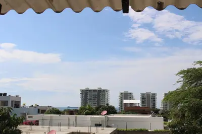 a view of a city skyline with tall buildings at Casa Grulla in Santa Marta