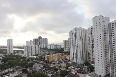 a city skyline with tall white buildings at Cartagena Piscina, playa y cerca centro Historico in Cartagena de Indias