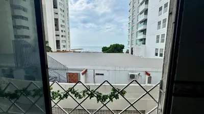 a view of a building from a window with buildings at Apartamento familiar, frente al mar, Bocagrande in Cartagena de Indias