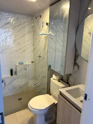 a bathroom with a toilet and a shower and a sink at Entire apartment with amazing views Tower 811 in Cartagena de Indias