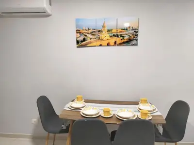 a dining room with a table with four chairs at Exclusivo Torices con Vista al Mar in Arizona