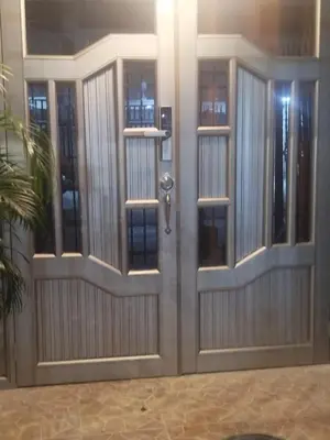 a front door of a building with glass at Ebratt Inn in Cartagena de Indias