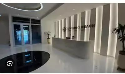 a lobby of a store with a table and a building at cartagena beach resort in Cartagena de Indias