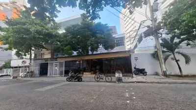 a group of motorcycles parked outside of a building at Apartasuite Marbella in Cartagena de Indias