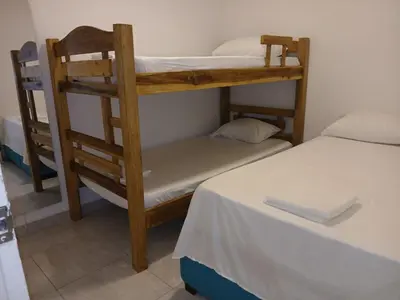 a couple of bunk beds in a room at Apartasuite Marbella in Cartagena de Indias