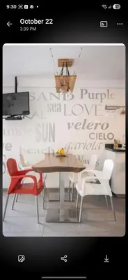 a dining room with a table and some chairs at El Laguito Apto Edf Nuevo Conquistador in Cartagena de Indias
