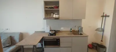 a small kitchen with a counter and a sink at Santa marina in Santa Marta