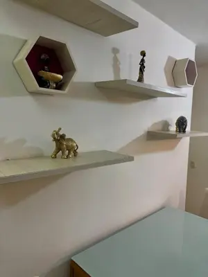 a room with shelves with a toy elephant on them at Apartamento moderno in Cartagena de Indias