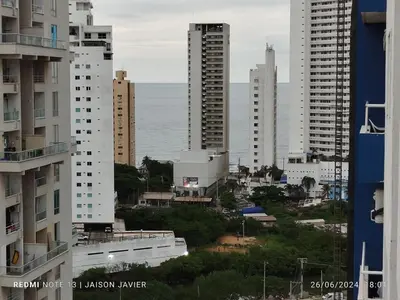 a view of a city with tall buildings and the ocean at Ciudad Amurallada in Cartagena de Indias