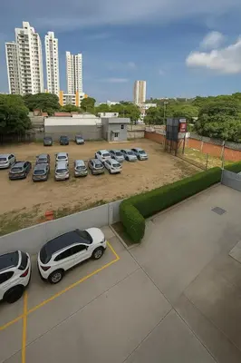 a group of cars parked in a parking lot at VIP Cartagena Close to the 415 Wall in Cartagena de Indias