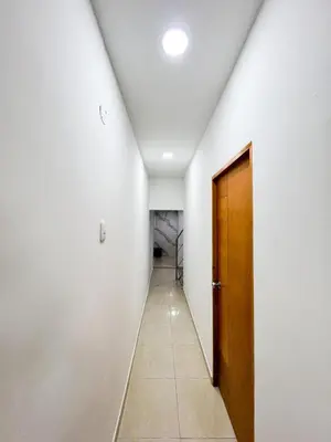 a hallway with a wooden door and a hallway with a room at Apartamento en Torices, sector turistico in Cartagena de Indias