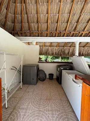 a room with a room with a dj and a table at Cabaña la fortuna in Turbaco